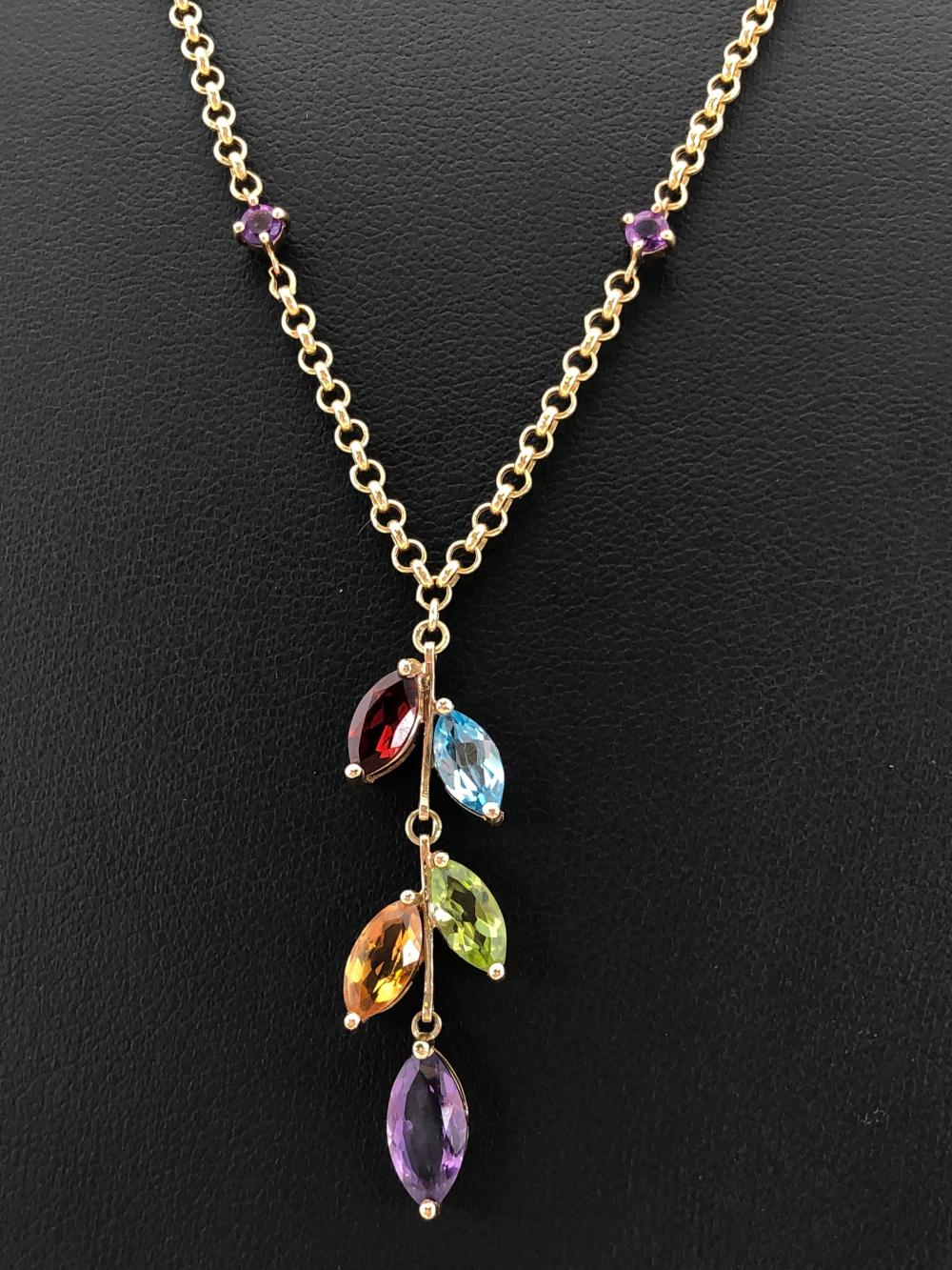 Gold Pendant with Gemstone